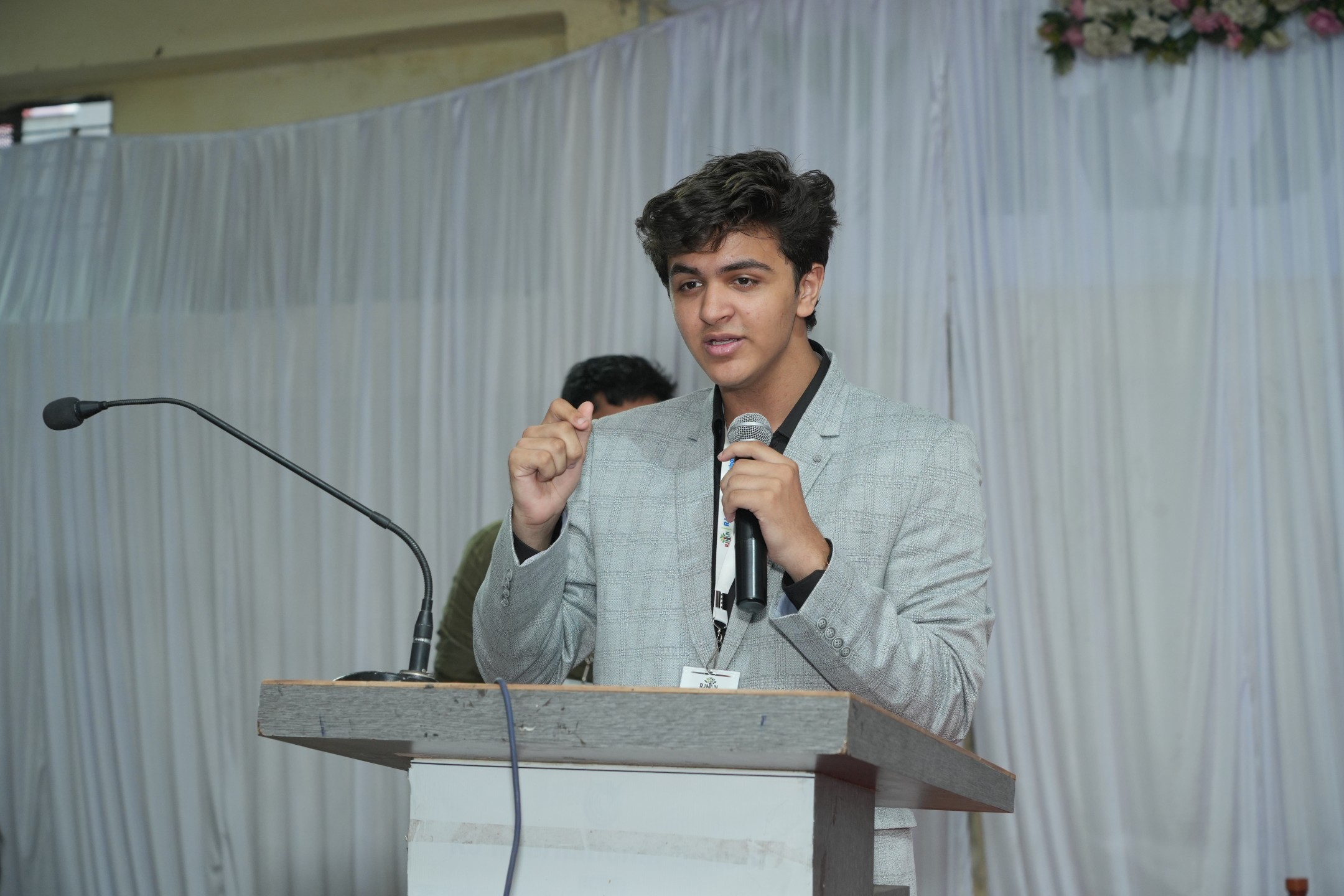 Aman Virani, a developer and debater from India.